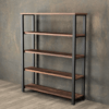 The Broadway Bookcase, featuring a minimalist and industrial design with four wooden shelves and a robust metal frame, stands against a textured grey wall. The light-colored wood plank flooring provides a striking contrast to the dark tones of the bookcase and wall.